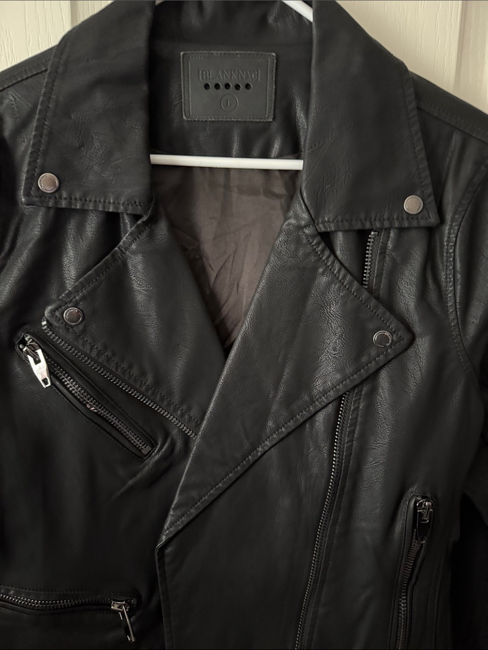 Blank NYC Black Faux Leather Moto Jacket with Zip Details
